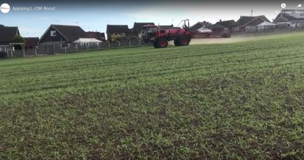 tractor Applying L-CBF Boost on farm